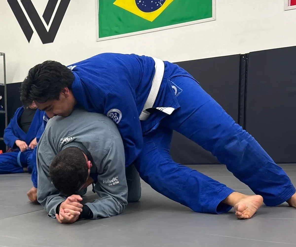 Adult students rolling on the mats at Ancaster Jiu-Jitsu in Ancaster